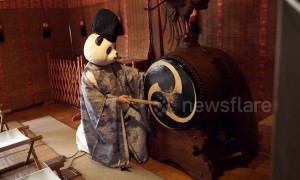 Shinto priest in Japan wears handmade panda mask to attract visitors to her shrine