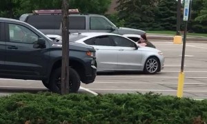 Gutsy Woman Tries to Stop Fleeing Car