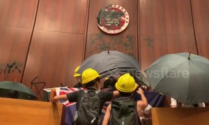 Hong Kong protesters take over legislative chamber