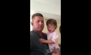 US father has amazing technique to trick daughter into not crying