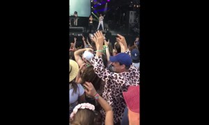 Actor Tony Gardner rocks out at Glastonbury