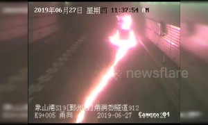 Chinese couple manage to escape minibus engulfed in flames