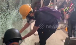 Hong Kong protesters smash windows and try to storm government headquarters