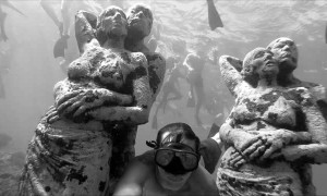 Crowds Swim to Underwater Statues