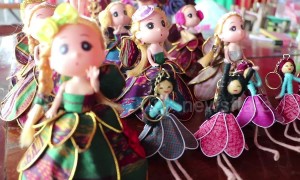 Remote village dressmakers flooded with orders for Thai silk Barbie doll costumes