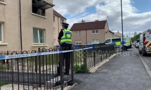 Man and dog killed in Scotland flat fire