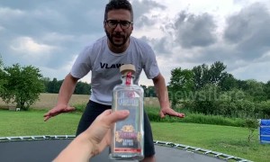 Funny moment YouTuber face plants after performing his own take on the bottle cap challenge