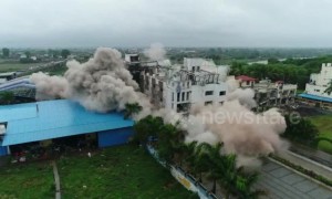 Controlled explosions demolish illegal hotel in northern India