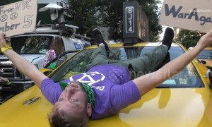 Hundreds of cyclists stage a 'die-in' protest at New York park