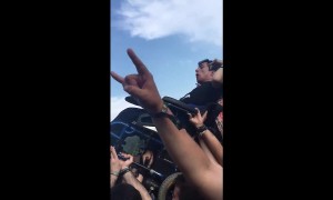Guy with disability gets crowd surfed at rock concert