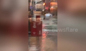 Shocking moment ice machine washed away on flooded New Orleans street