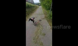 Swedish toddler takes a painful tumble while riding bike down a hill