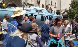 Extinction Rebellion boat blocks road outside Royal Courts of Justice in London