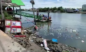 Rescuers search for survivors after temple collapses into river in Thailand