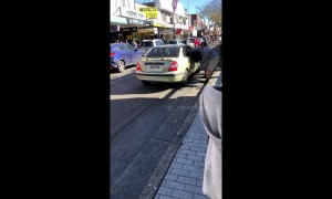 Shocking Sydney road rage results in man nearly being dragged out of car
