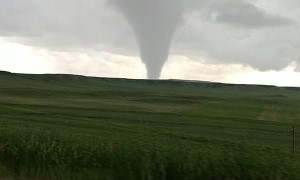 Storm Chasers Catch Tornado Touchdown