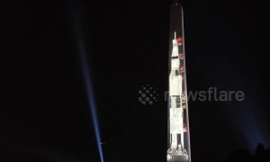 Apollo 11's Saturn V rocket projected to scale on Washington Monument to mark moon landing anniversary