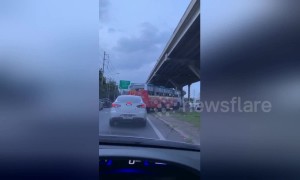 Thailand bus driver scrambles off highway to hurry to bathroom