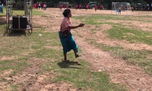 Hilarious moment supportive grandmother gets carried away watching kids' football match in Thailand