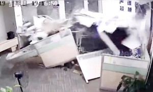 Chinese woman accidentally slams car into office injuring two people