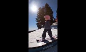 Three-year-old snowboarder takes on the slopes
