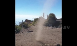 A man uses his kung-fu moves on a dust devil