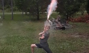 Kid with Roman Candle Takes Out Camera