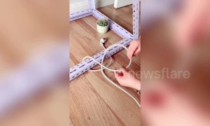 Incredible life hack! Chinese woman shows how to free plug cable trapped under table