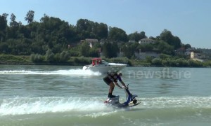 Austrian stuntman demonstrates extreme Vespa waterskiing