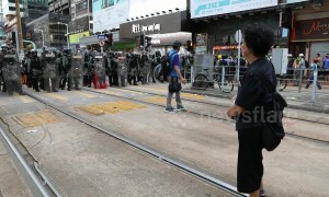 Standoff between police and protesters in Hong Kong's Yuen Long district