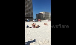 Beach bros use backflips to impress women on Florida beach