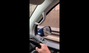 Rain floods two lanes on UK motorway during rush hour