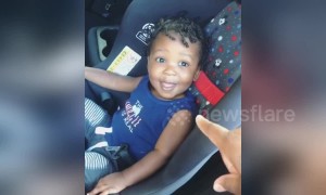 'Who me?' Toddler can't keep a straight face as mom lectures him