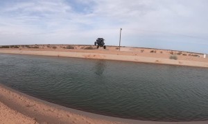 Kid Soars Across Canal in Buggy