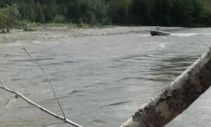 Boat Jumps River Blockage