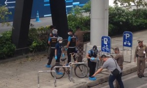 Police and forensics teams at scene of BTS Chong Nonsi station bomb