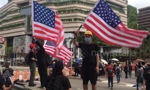 Protesters in Hong Kong seen waving US flags