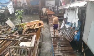 Tropical storm batters coastal homes in the Philippines