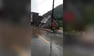 Several houses collapse as flash floods sweep northern China