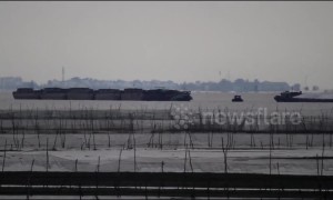Mysterious mirage of an ancient city appears over Chinese lake
