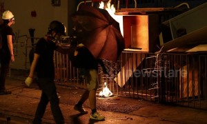 Hong Kong protestors start fire at police station as fire department rushes to extinguish it
