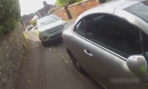 Officer smashes window to save dog locked inside hot car