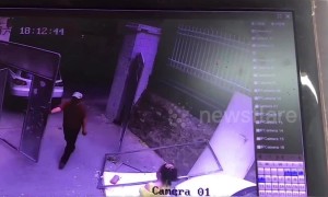 Metal billboard hits Chinese woman’s head after being blown off by wind