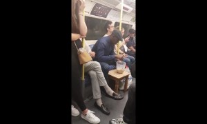 UK man makes a cup of tea with a jug and kettle while on the tube
