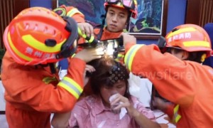 Firefighters free woman's hair from massage chair in China