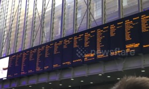 During a London power outage hundreds of commuters pile out of Kings Cross station