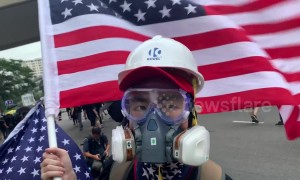 Hong Kong protesters wave US flags before police crackdown