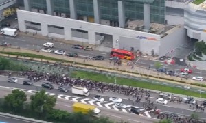 Thousands of protesters leave Hong Kong airport after forcing shutdown