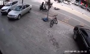 Chinese boy almost gets run over after riding segway on a road