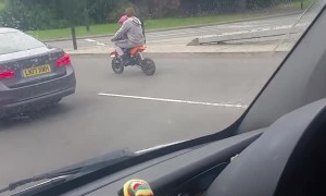 Biker Runs Red Light with Baby Onboard